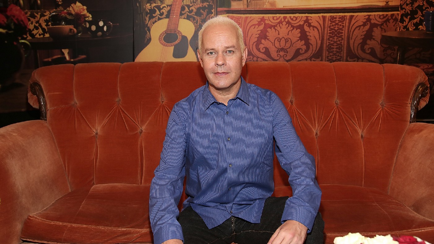 James Michael Tyler on a Central Perk-style sofa 