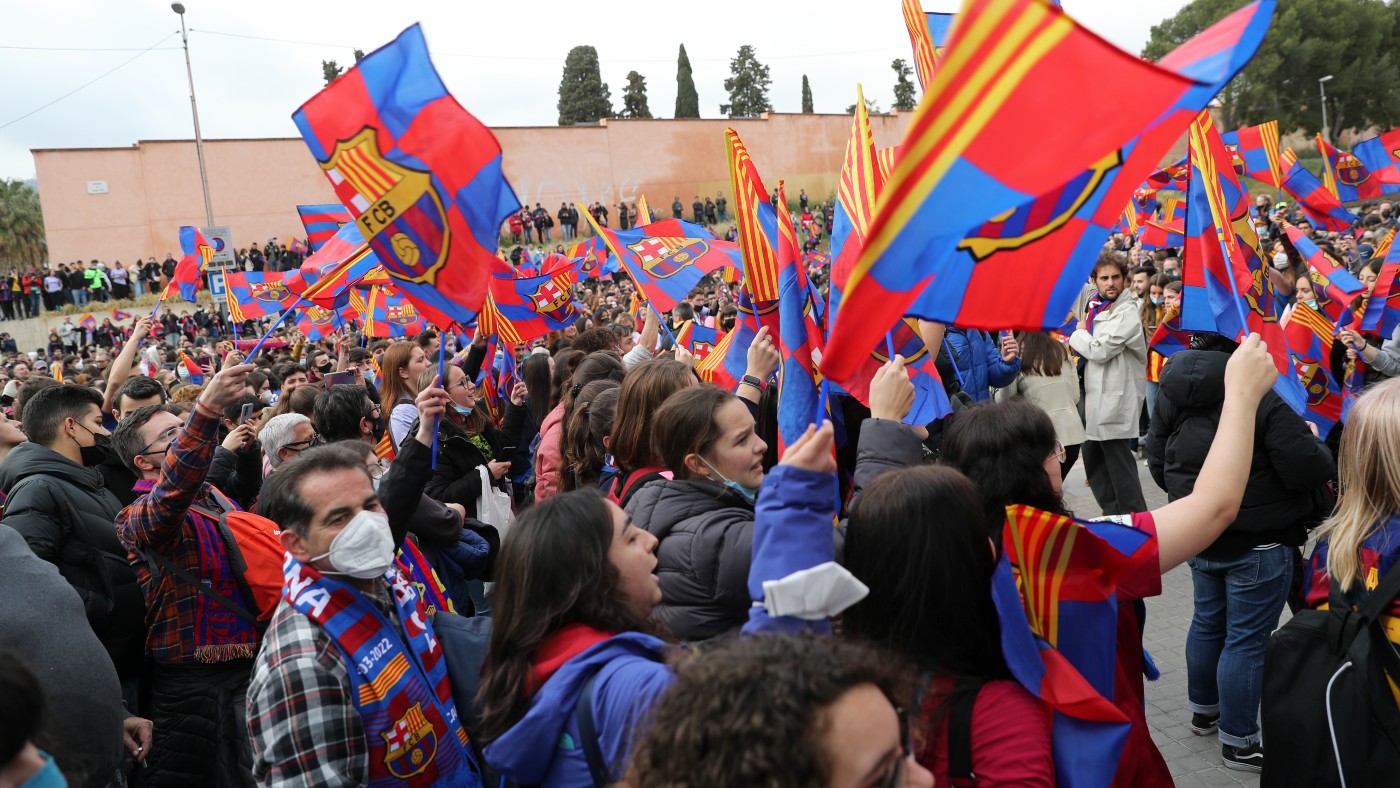Barcelona supporters welcome their team before the Uefa Women’s Champions League match against Real Madrid   