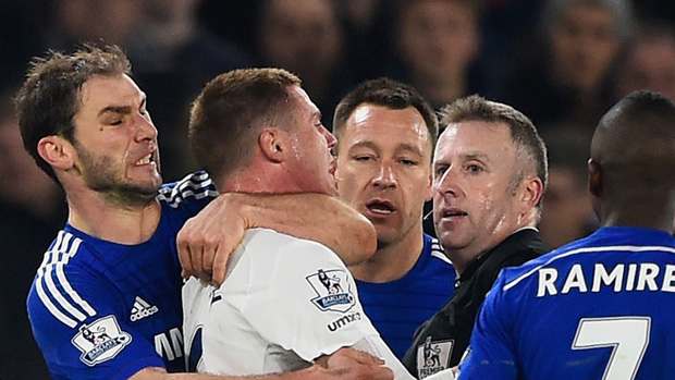 Branislav Ivanovic of Chelsea clashes with James McCarthy of Everton
