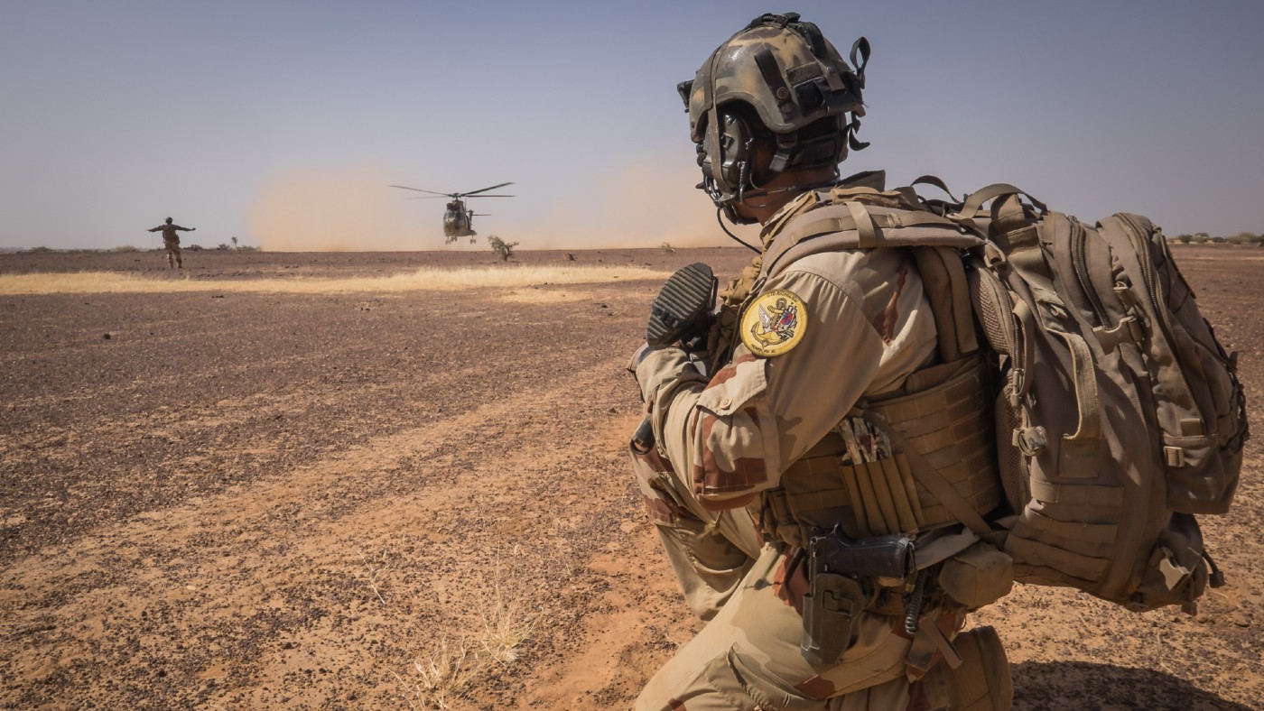 A French soldier in a field in Mali