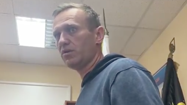 Alexei Navalny in a Moscow police station following his arrest