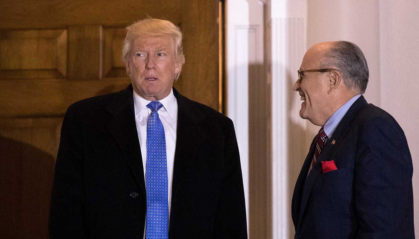 Rudy Giuliani, right, denies that Donald Trump plans to pardon himself