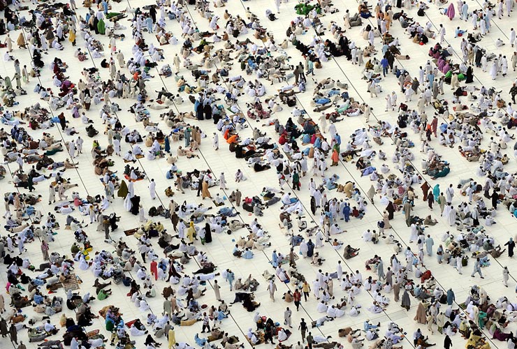 Muslim pilgrims wait for the start of prayers at the Grand Mosque in Mecca during the hajj