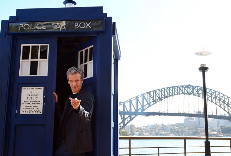 Doctor Who star Peter Capaldi poses in front of Sydney Harbour Bridge