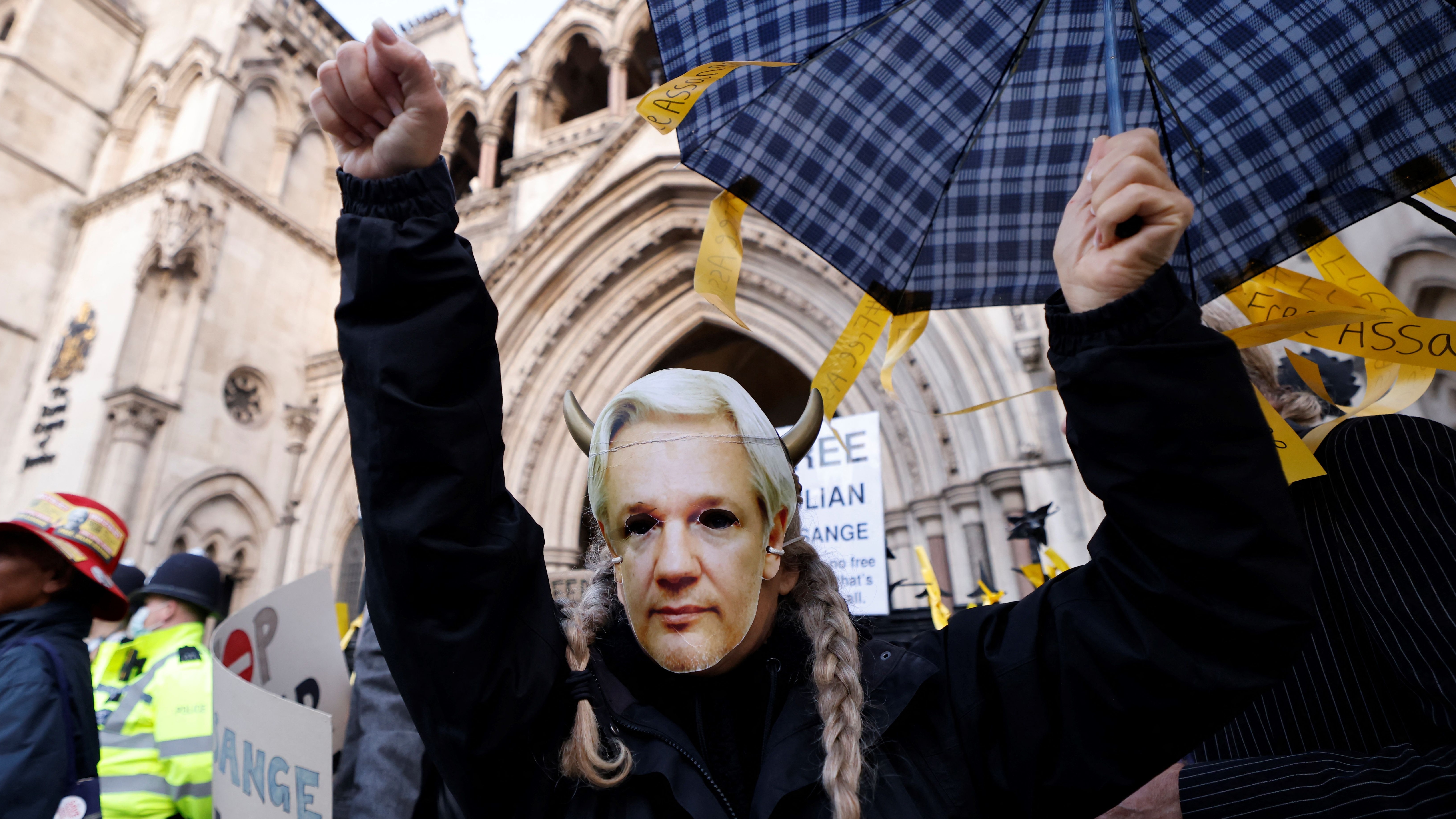 Protestors voice their support for Julian Assange outside the High Court in London