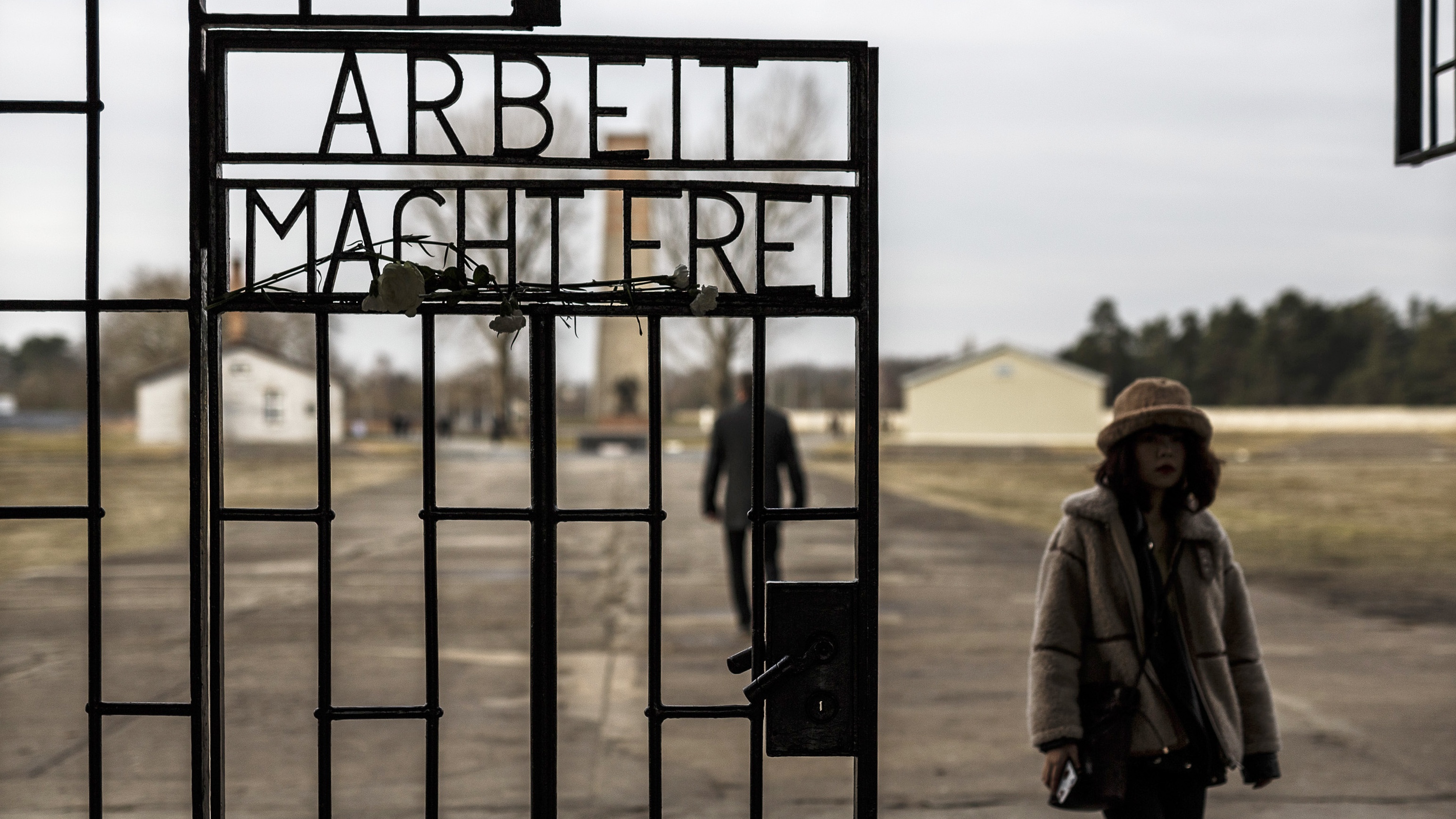 Visitors at the entrance of Sachsenhausen Nazi concentration camp