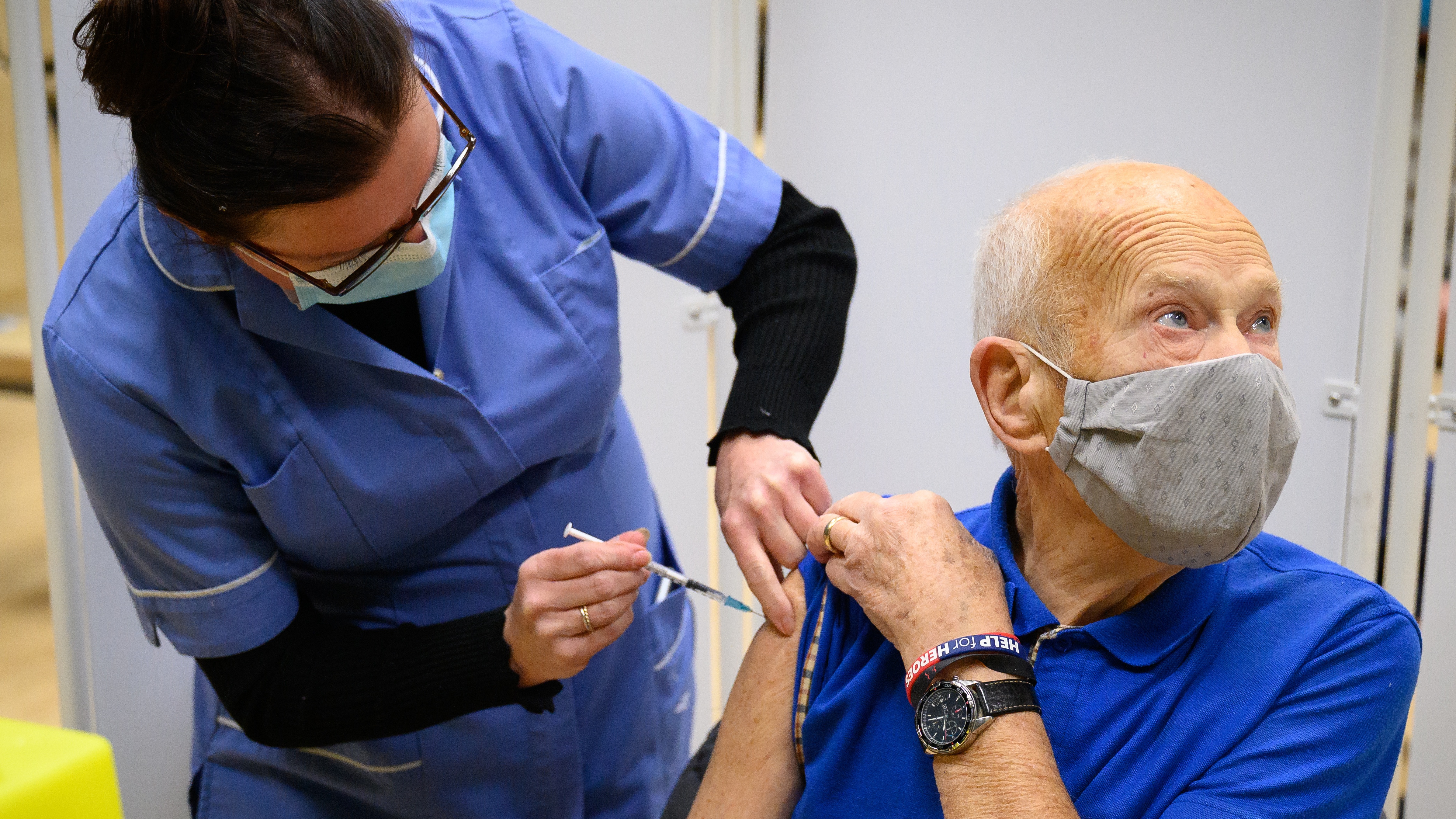 An elderly man receives his Covid vaccination in Surrey.