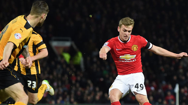 James Wilson of Manchester United in action during the march with Cambridge United 