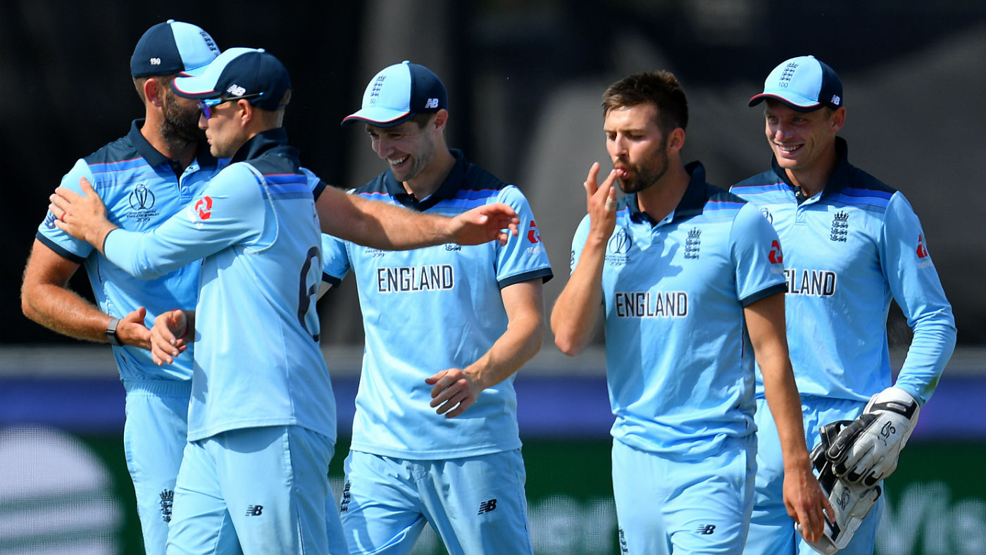 England bowler Mark Wood celebrates his run out of New Zealand’s Kane Williamson