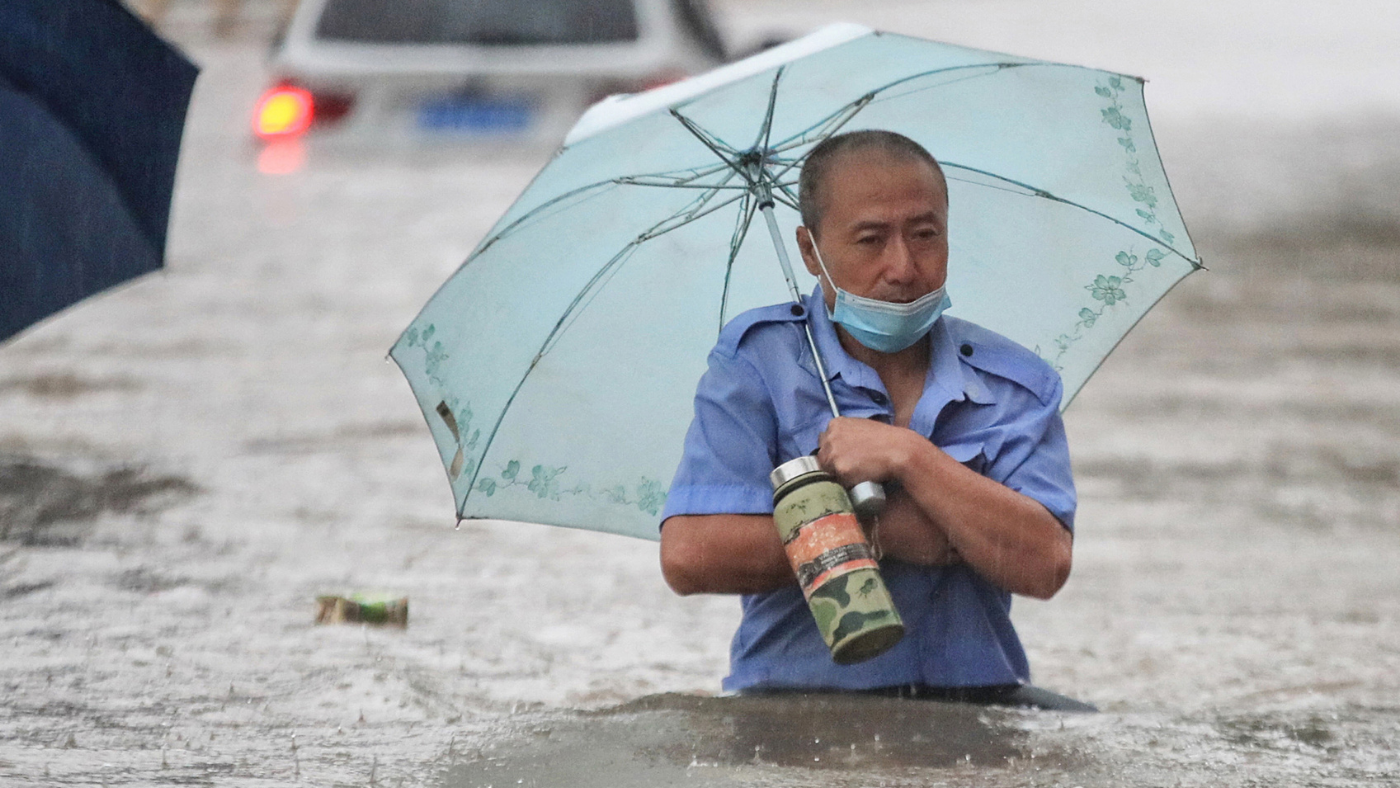 Man walks in flood