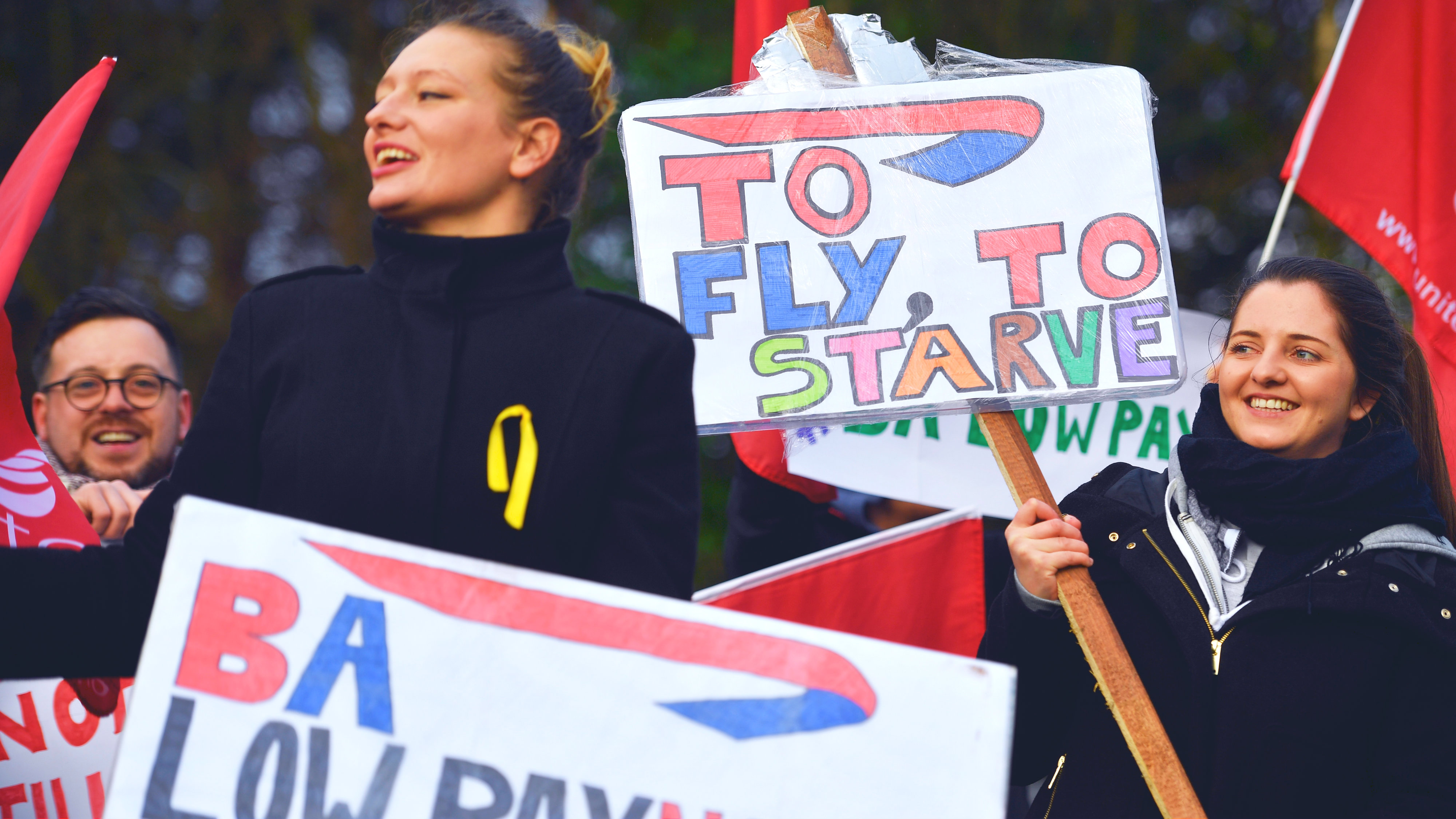 British Airways cabin crew demonstrate outside Glasgow Airport during a two-day strike against low pay