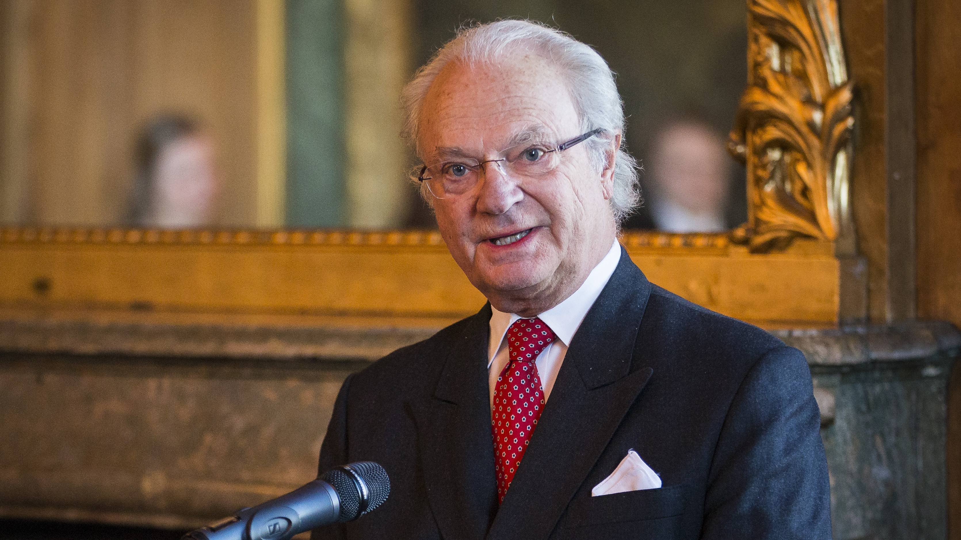 King Carl XVI Gustaf of Sweden gives a speech at the opening of the exhibition.