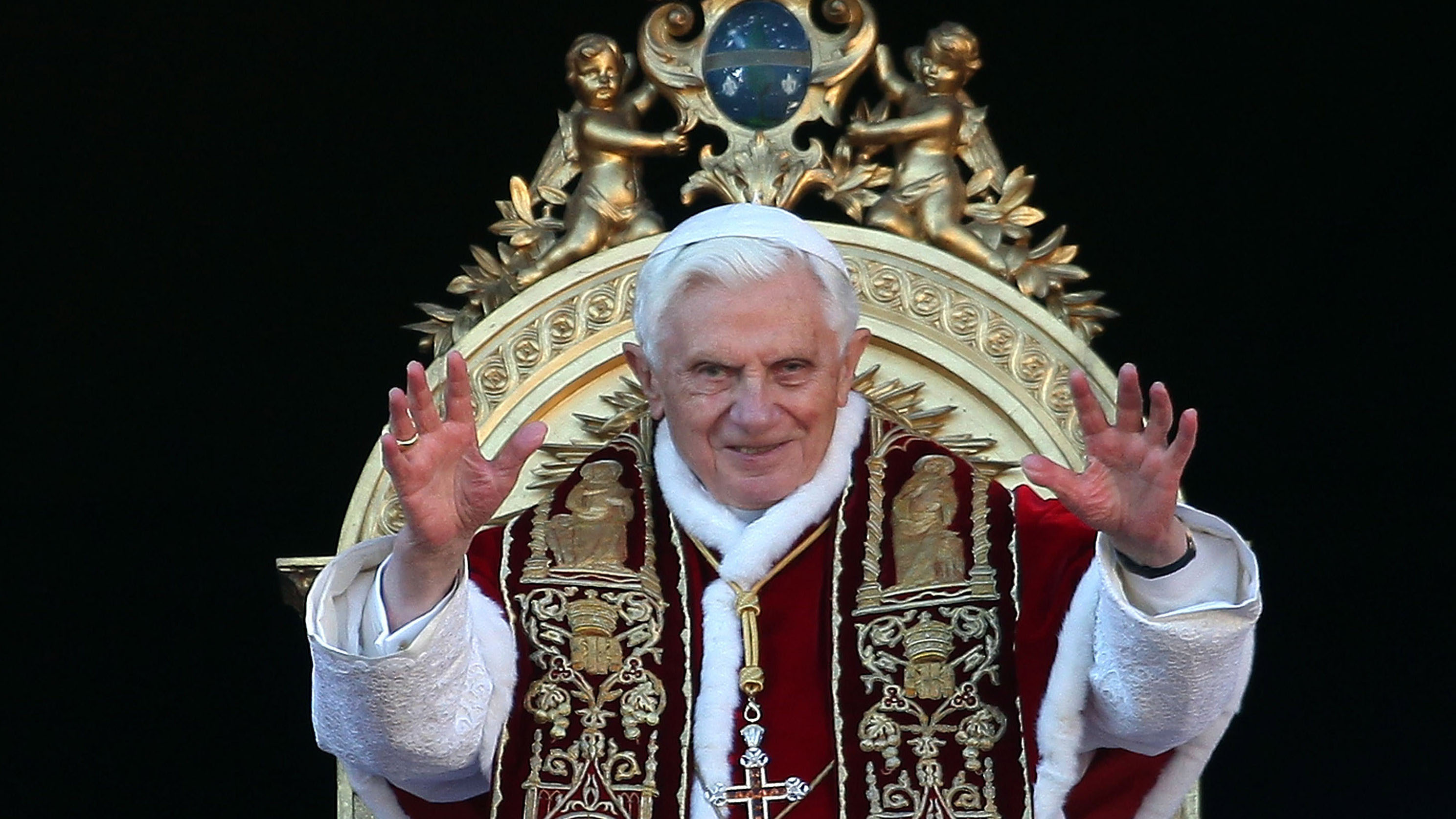VATICAN CITY, VATICAN - DECEMBER 25:Pope Benedict XVI waves to the faithfuls as he delivers his Christmas Day message &#039;urbi et orbi&#039; blessing (to the city and to the world) from the central b