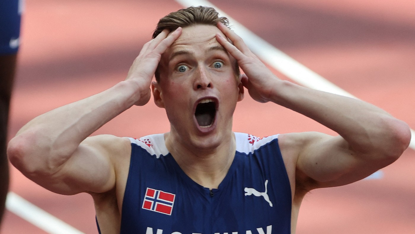 Karsten Warholm reacts after breaking the 400m hurdles world record  