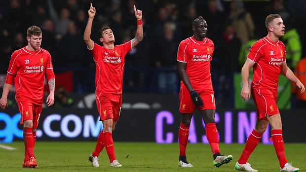  Philippe Coutinho of Liverpool celebrates scoring the second goal 