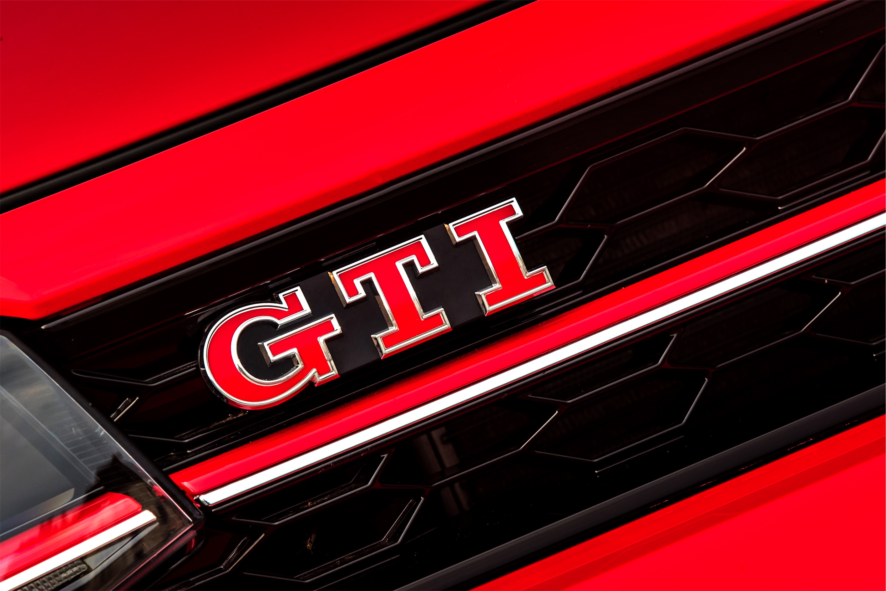 Volkswagen Golf GTI red logo