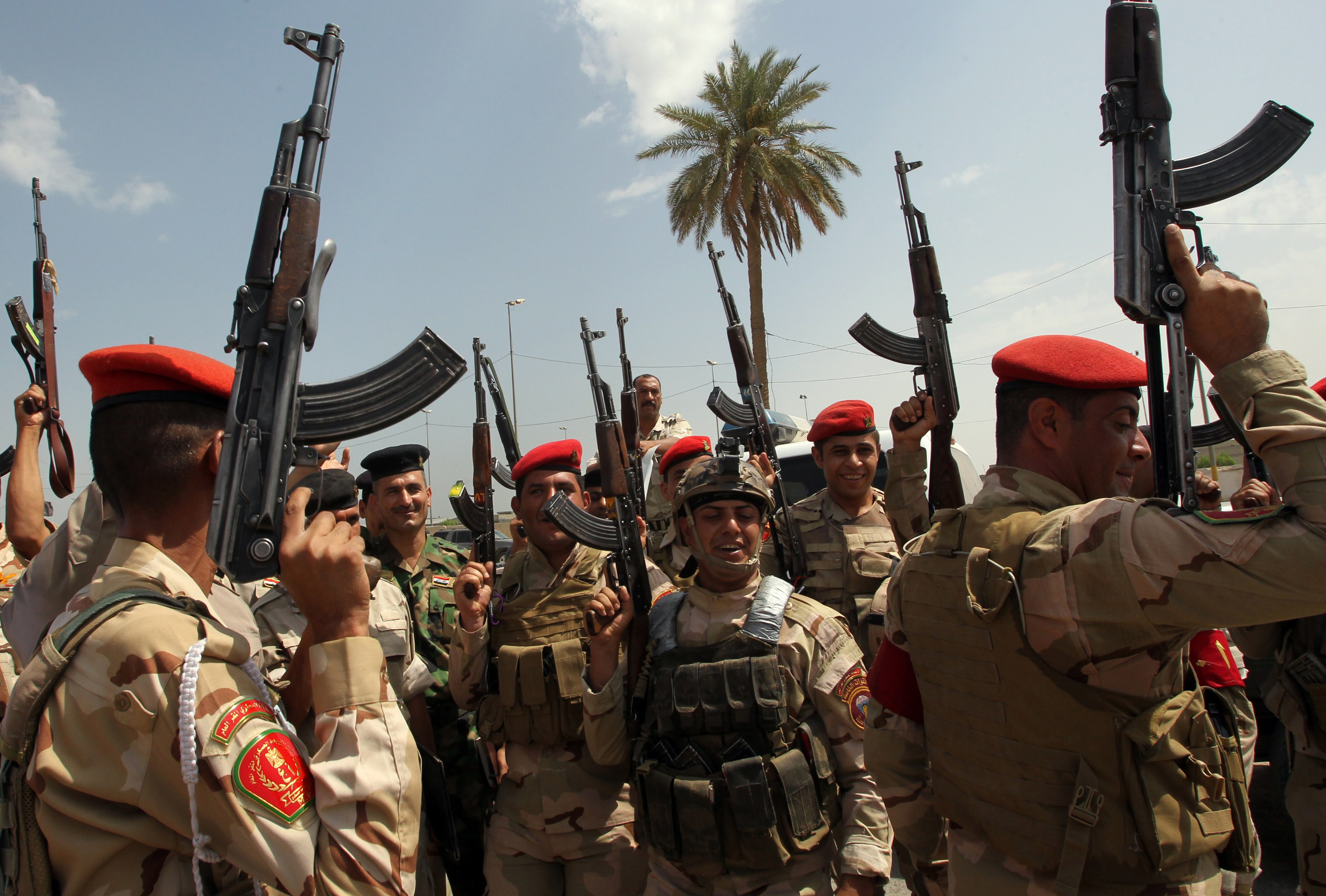 Iraqi army troops chant slogans against the Islamic State of Iraq and Syria (Isis)