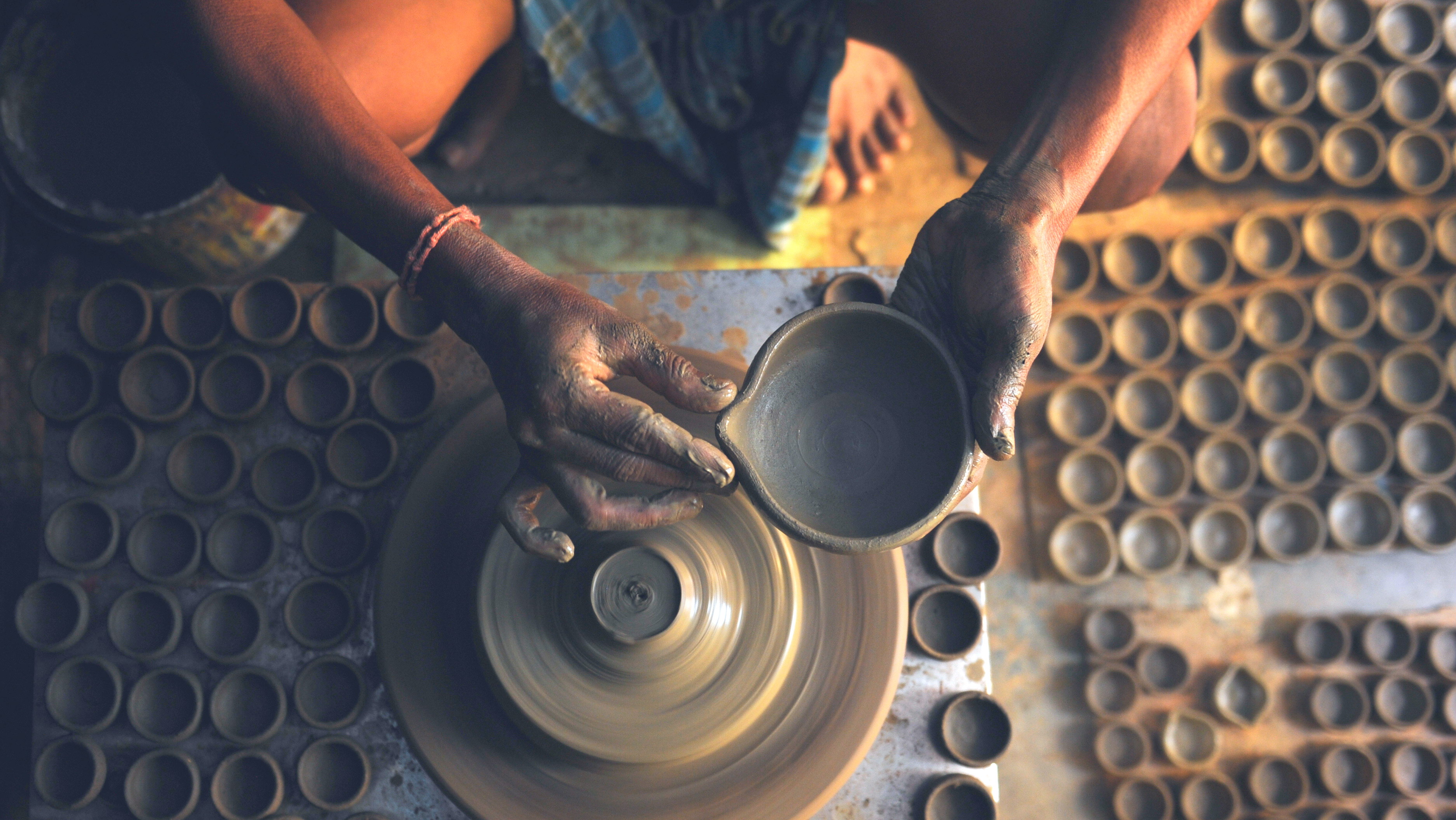 A potter in Chennai makes &#039;diyas&#039; - earthenware oil lamps - ahead of the Diwali festival of lights