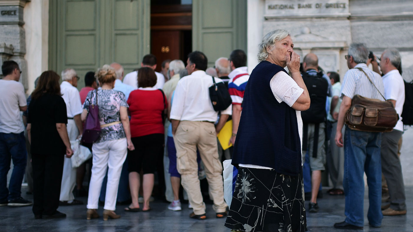 People queue for the Greek central bank at the height of the debt crisis