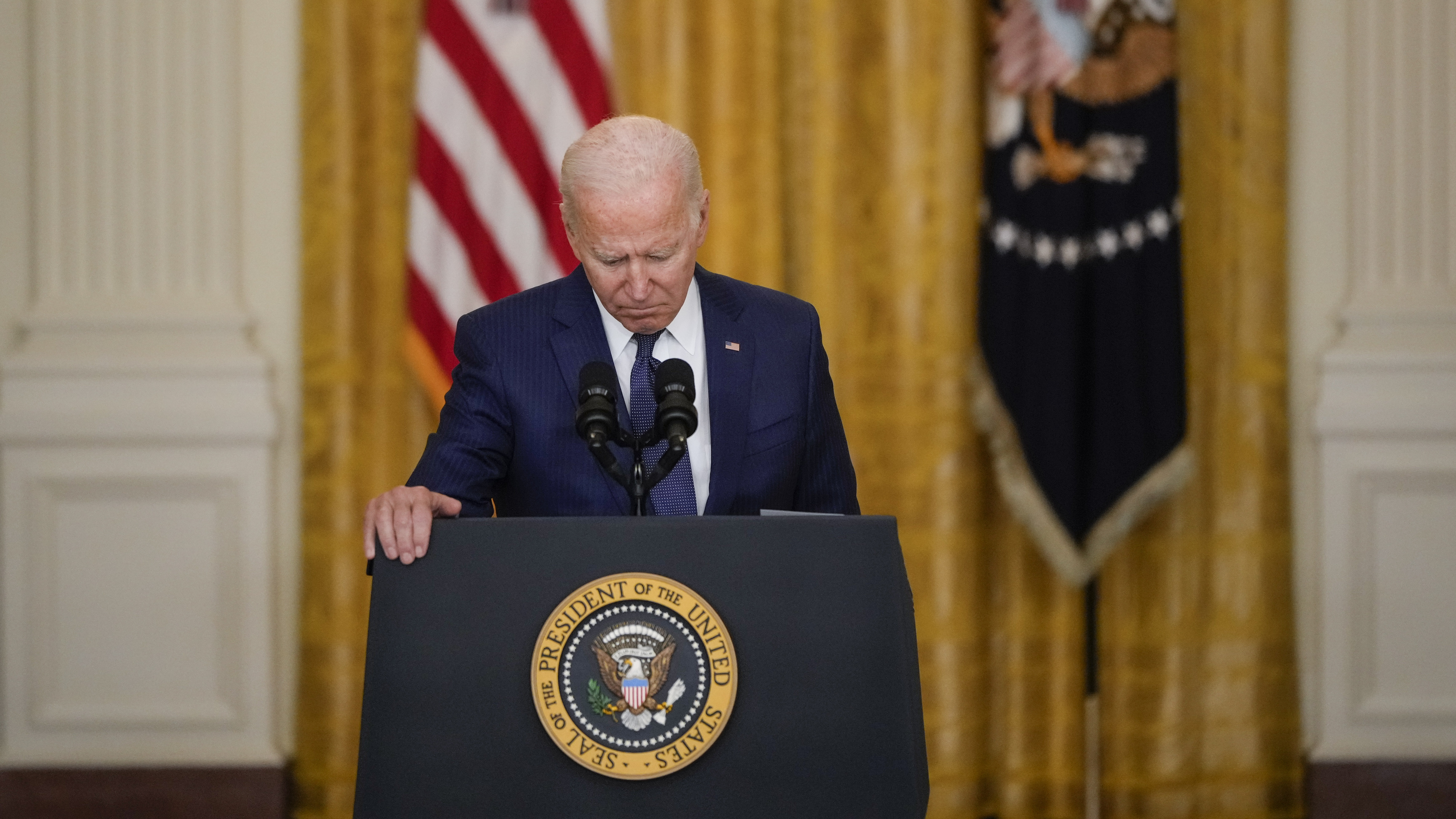 President Joe Biden pauses while he speaks about the situation in Afghanistan in the East Room of the White House on August 26, 2021 in Washington, DC.