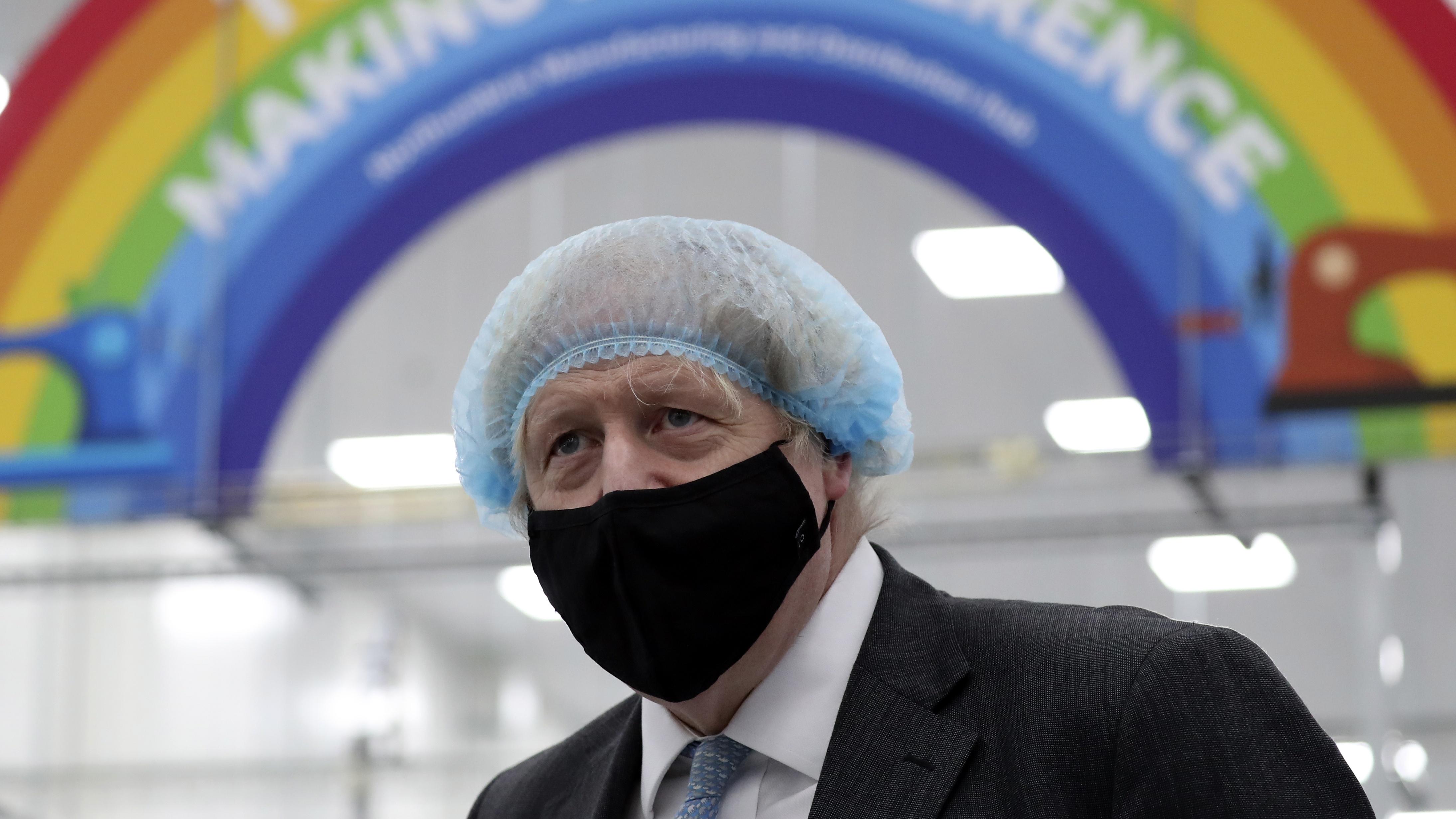 Boris Johnson visits a PPE manufacturing facility in the north of England
