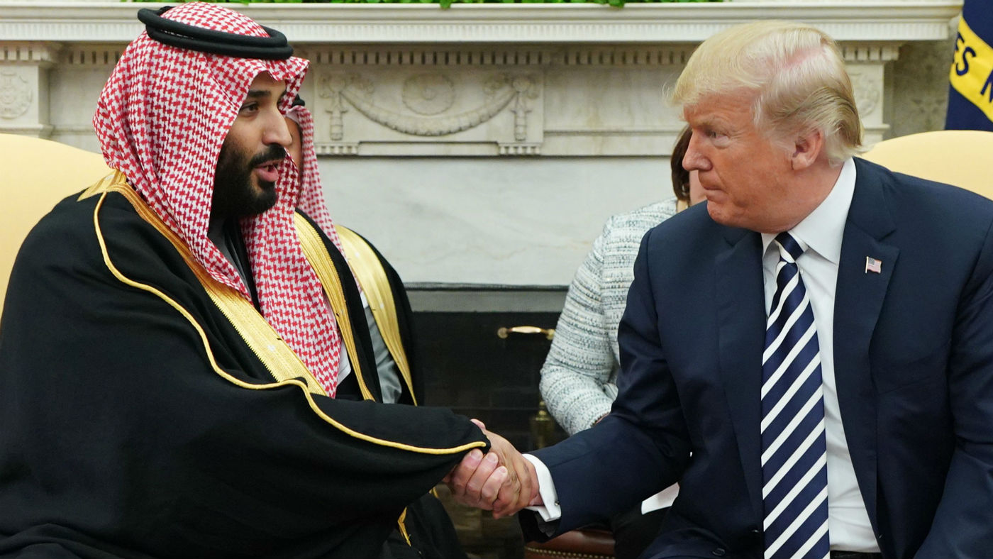 Donald Trump shakes hands with Crown Prince Mohammed bin Salman
