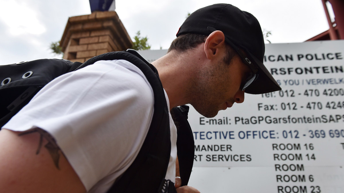 --SOUTH AFRICA OUT--Former Olympian Oscar Pistorius arrives at the Garsfontein Police Station in Pretoria to perform his first shift of community service after being released under house arre
