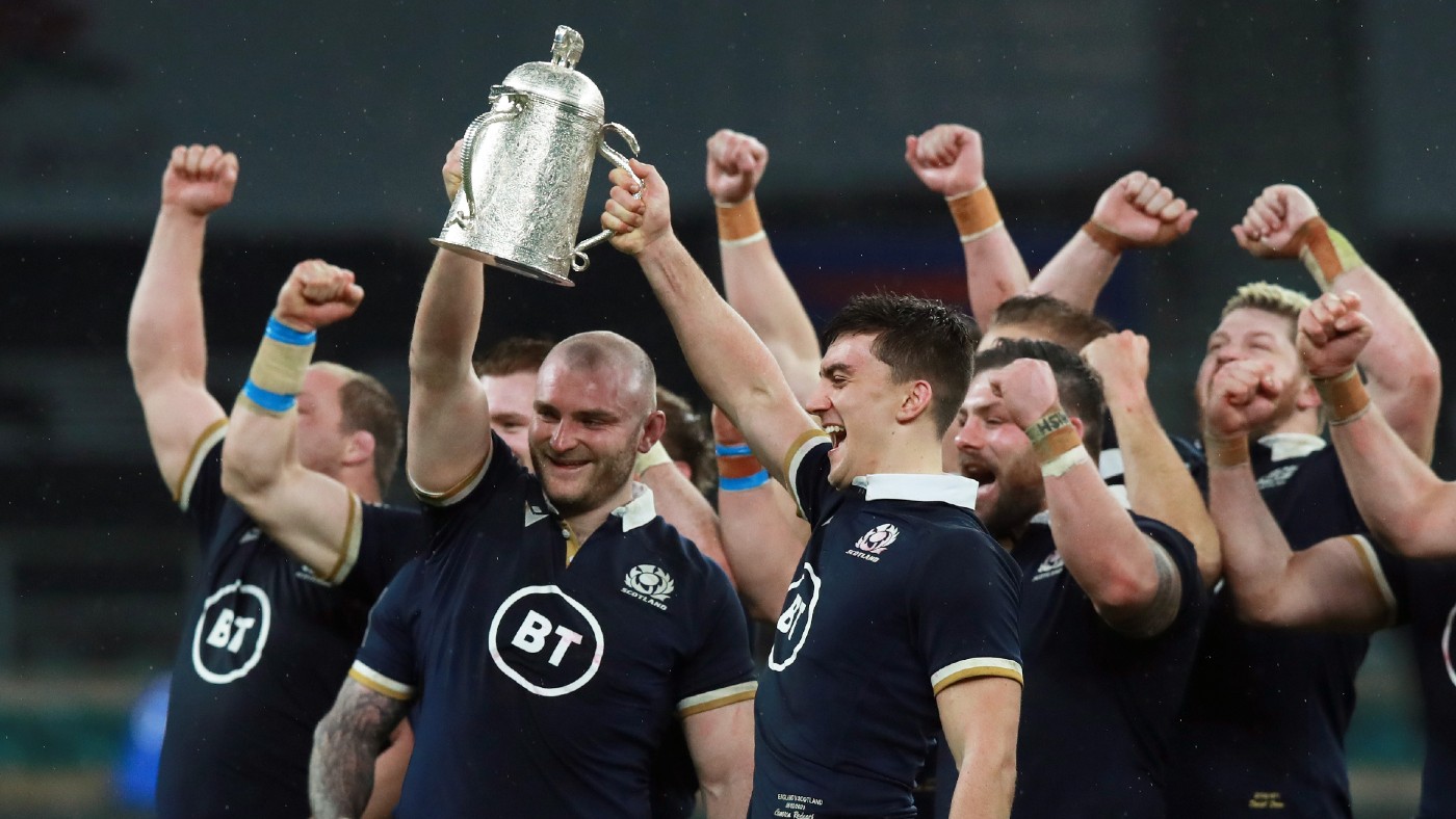 Scotland’s David Cherry and Cameron Redpath lift the Calcutta Cup following the win over England at Twickenham  