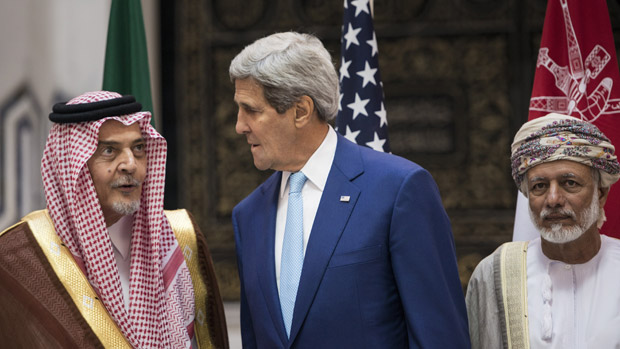 US Secretary of State John Kerry, Saudi Foreign Minister Prince Saud al-Faisal and Omani Foreign Minister Yussef bin Alawi