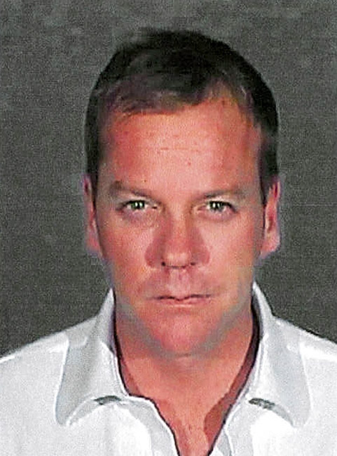GLENDALE CITY, CA - DECEMBER 5:In this handout photo provided by the Glendale City Police Department , actor Kiefer Sutherland poses for his mugshot photo at Glendale City Jail December 5, 20