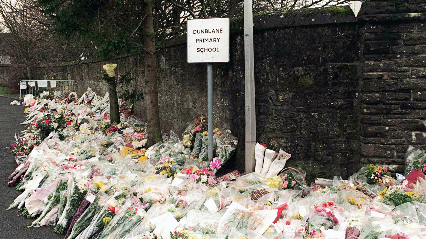 Tributes left outside Dunblane Primary School following the mass shooting