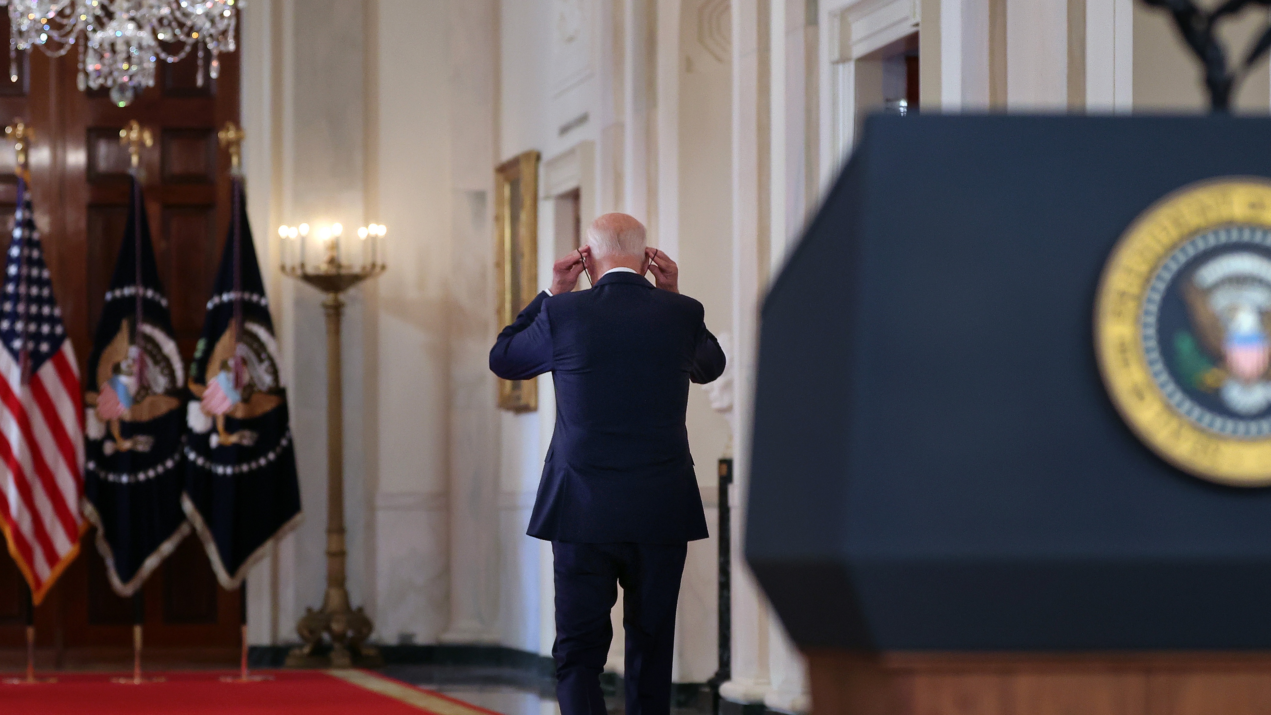 Joe Biden departs after giving his closing remarks on the US withdrawal from Afghanistan