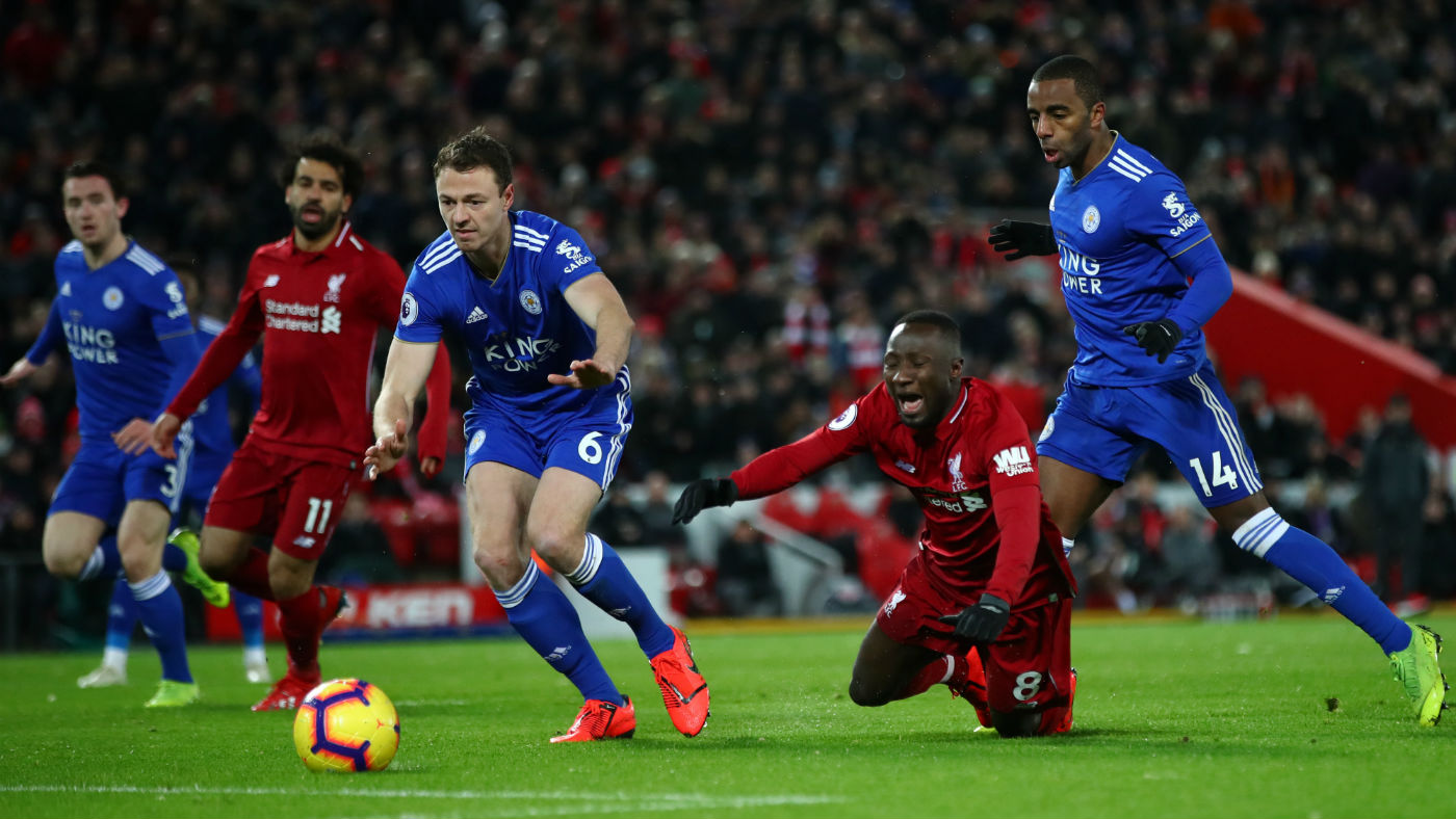 Liverpool’s Naby Keita is challenged by Leicester City’s Ricardo Pereira but no penalty was given