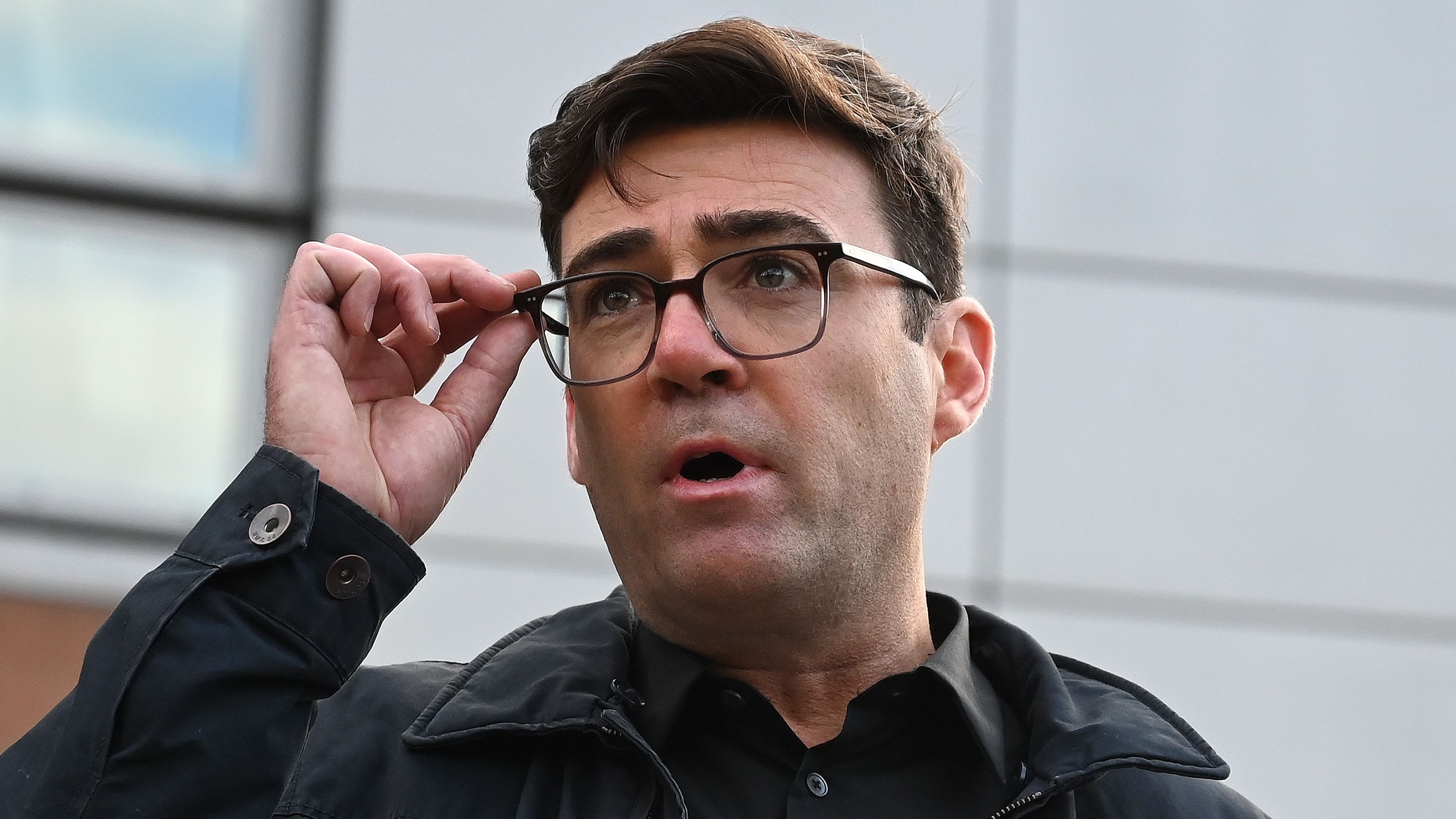 Andy Burnham speaks to the media at a press conference outside The Bridgewater Hall in Manchester.