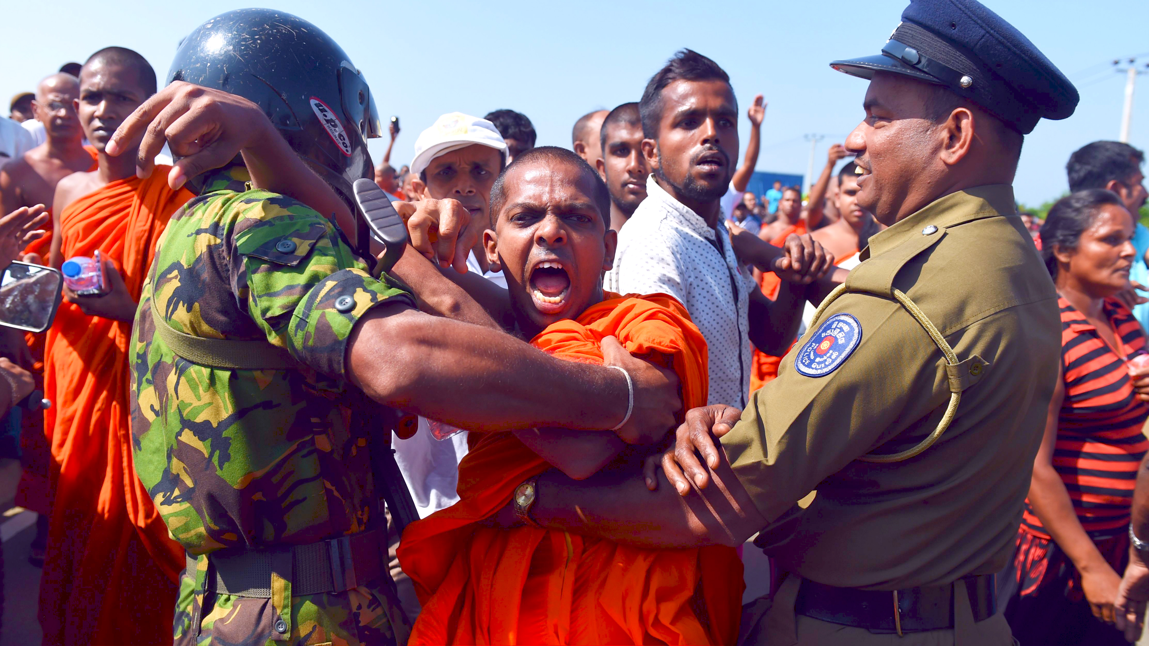 Sri Lankan buddhist monks protest against the creation of an industrial zone for Chinese investments on the island