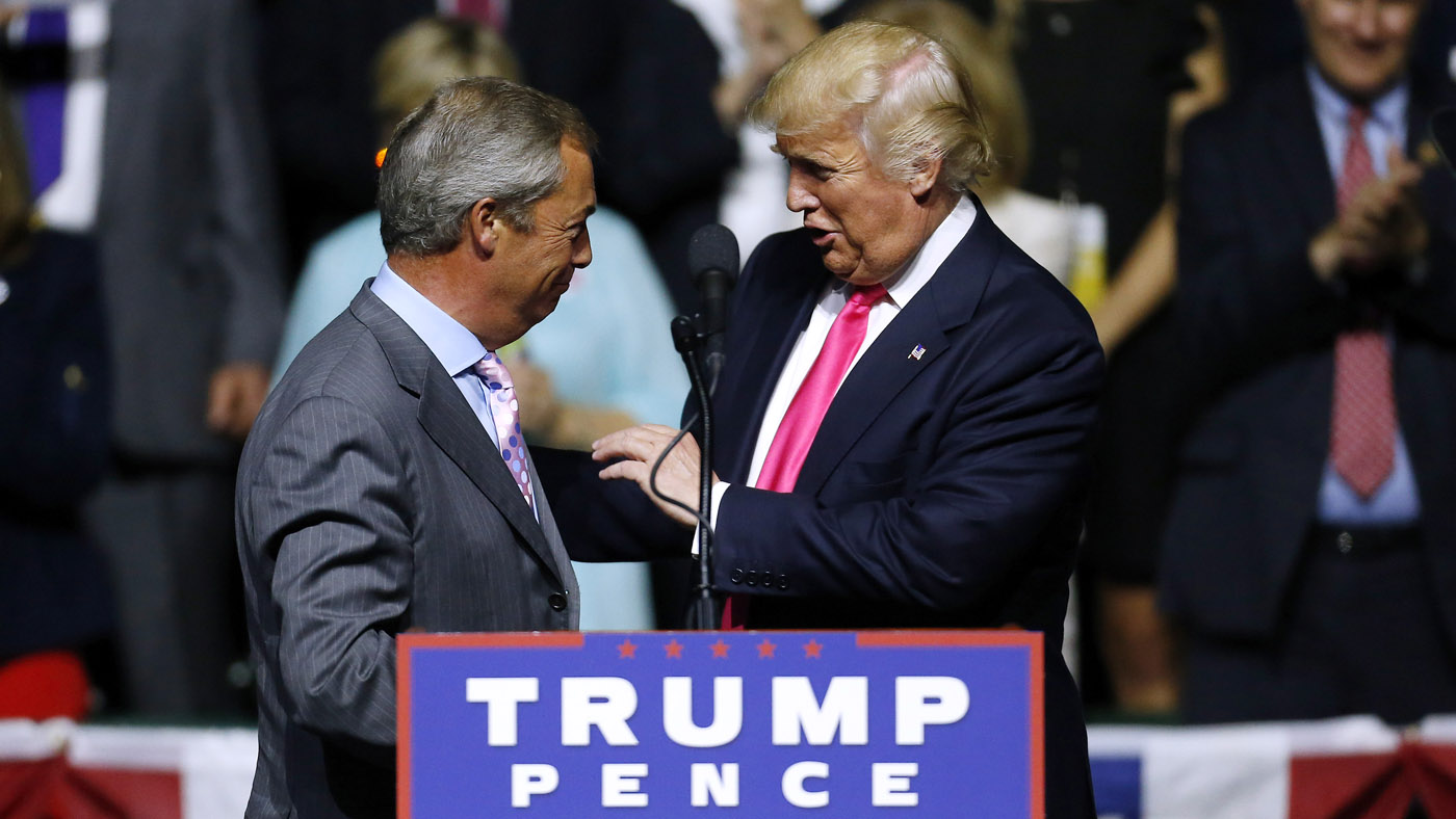 JACKSON, MS - AUGUST 24: Republican Presidential nominee Donald Trump, right,greets United Kingdom Independence Party leader Nigel Farage during a campaign rally at the Mississippi Coliseum o