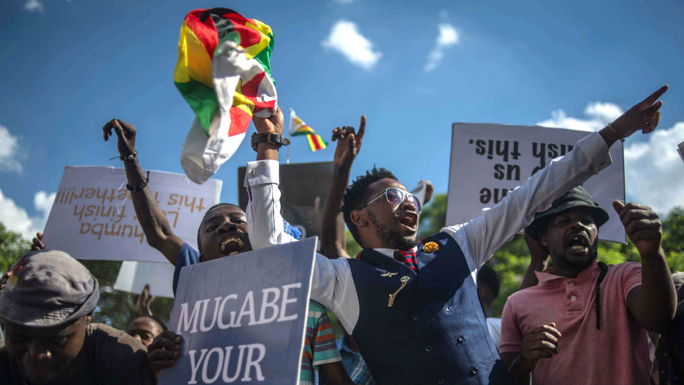 Zimbabweans take to the street to celebrate the coup
