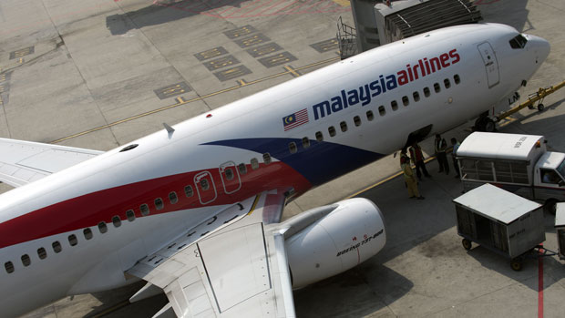A Malaysian Airlines plane prepares for take-off at Kuala Lumpur International Airport