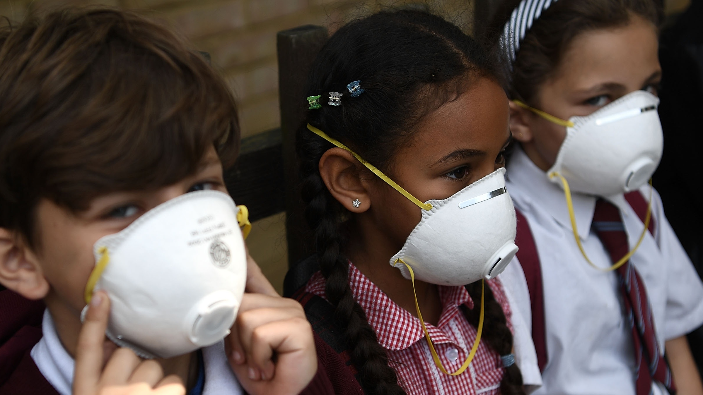 Children wearing face masks.