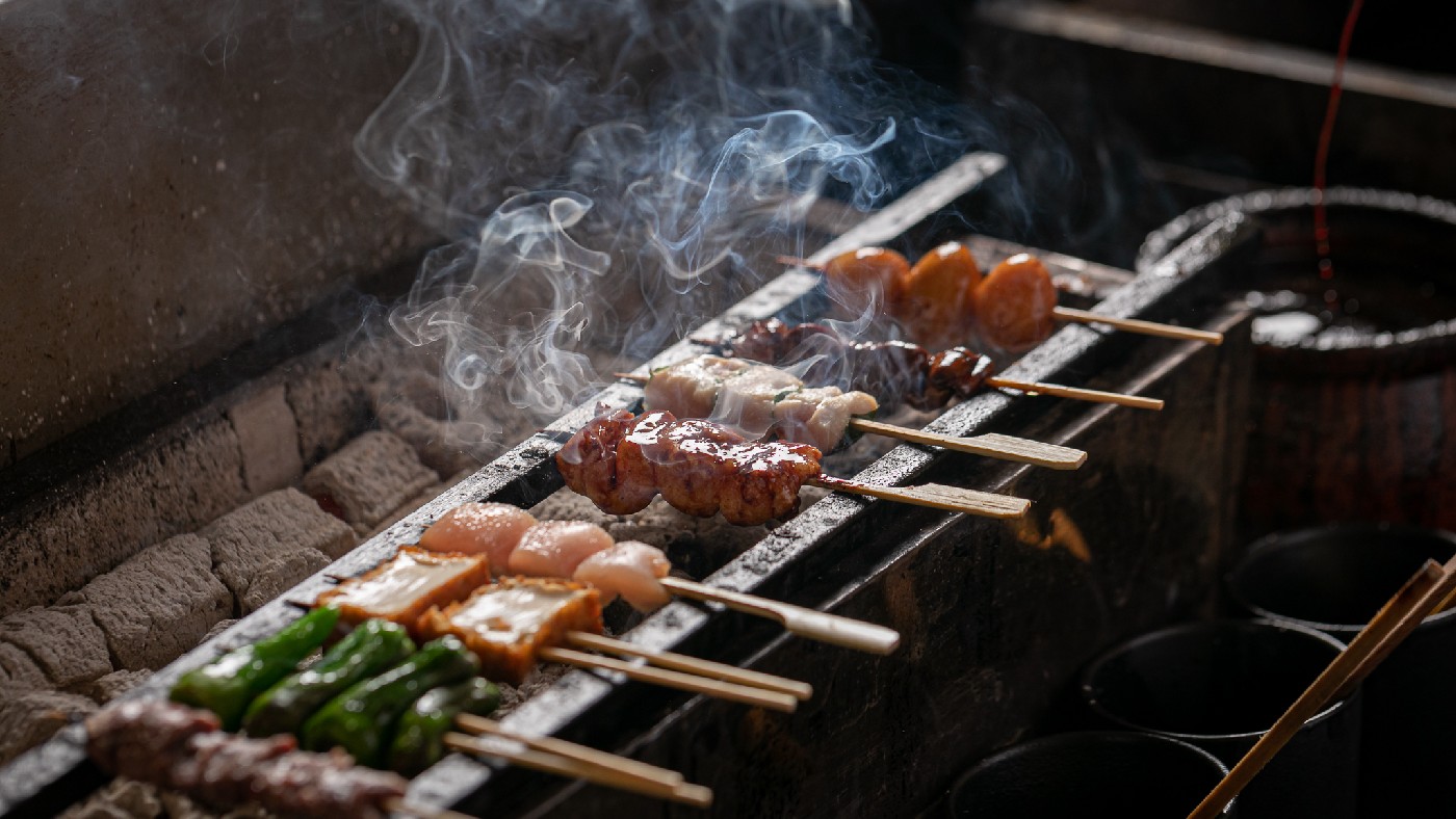 Yakitori being grilled