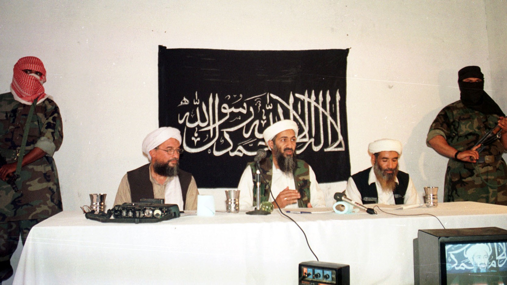 Osama bin Laden (centre) and Ayman al-Zawahiri (left) in 1998