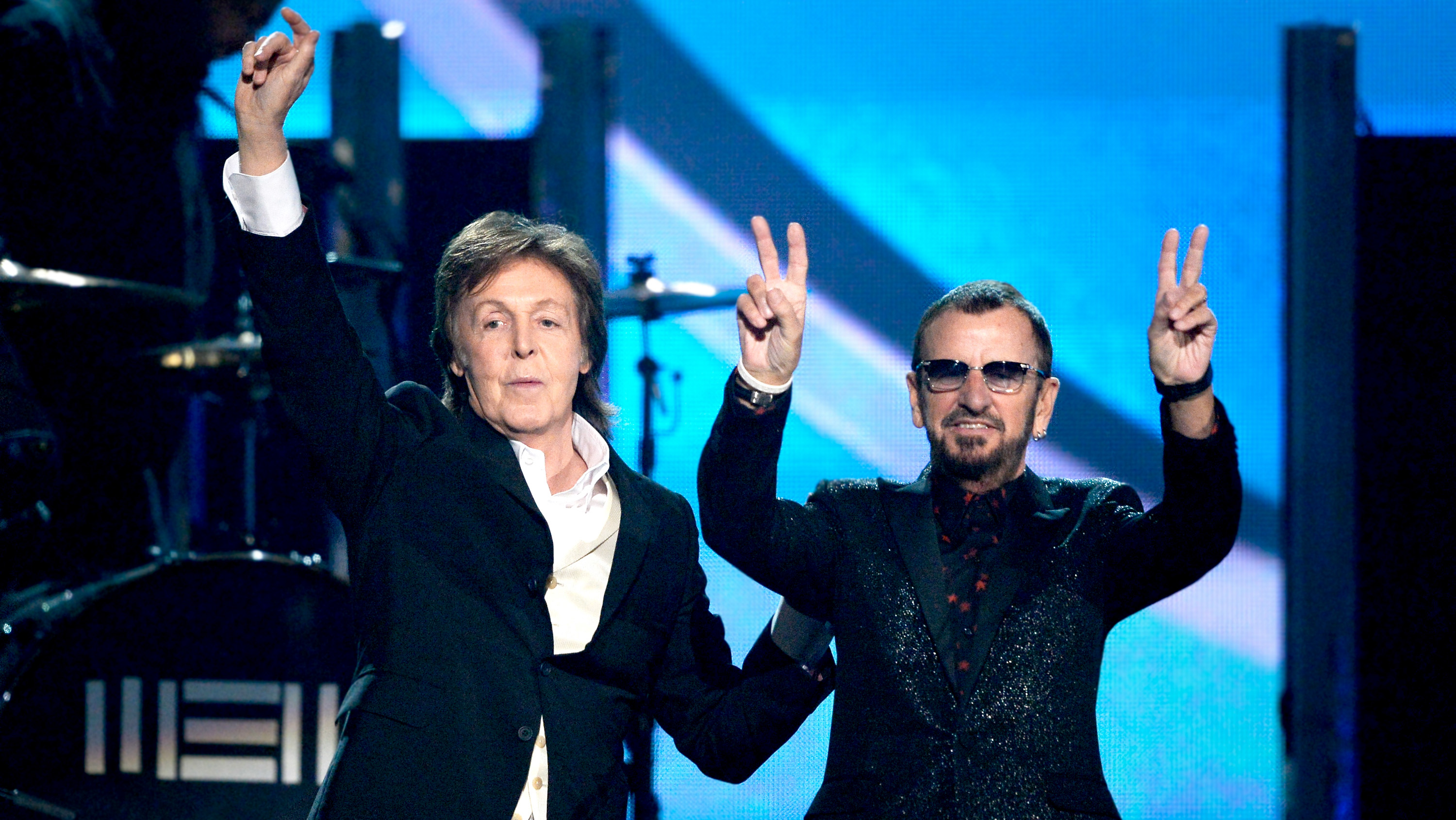 LOS ANGELES, CA - JANUARY 26:Musicians Paul McCartney (L) and Ringo Starr of The Beatles perform onstage during the 56th GRAMMY Awards at Staples Center on January 26, 2014 in Los Angeles, Ca