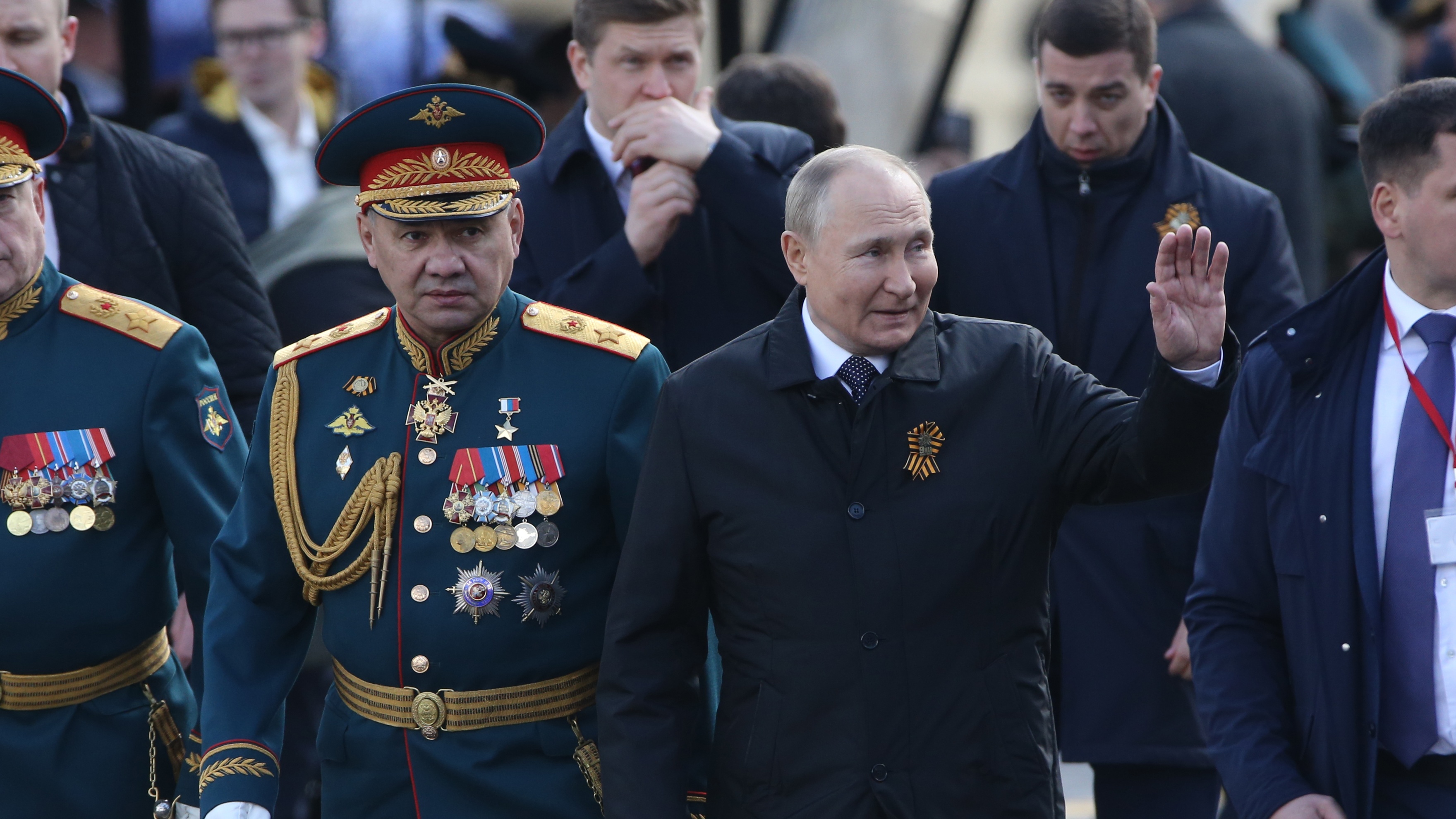 Vladimir Putin and Defence Minister Sergei Shoigu attend the Victory Day parade in Red Square