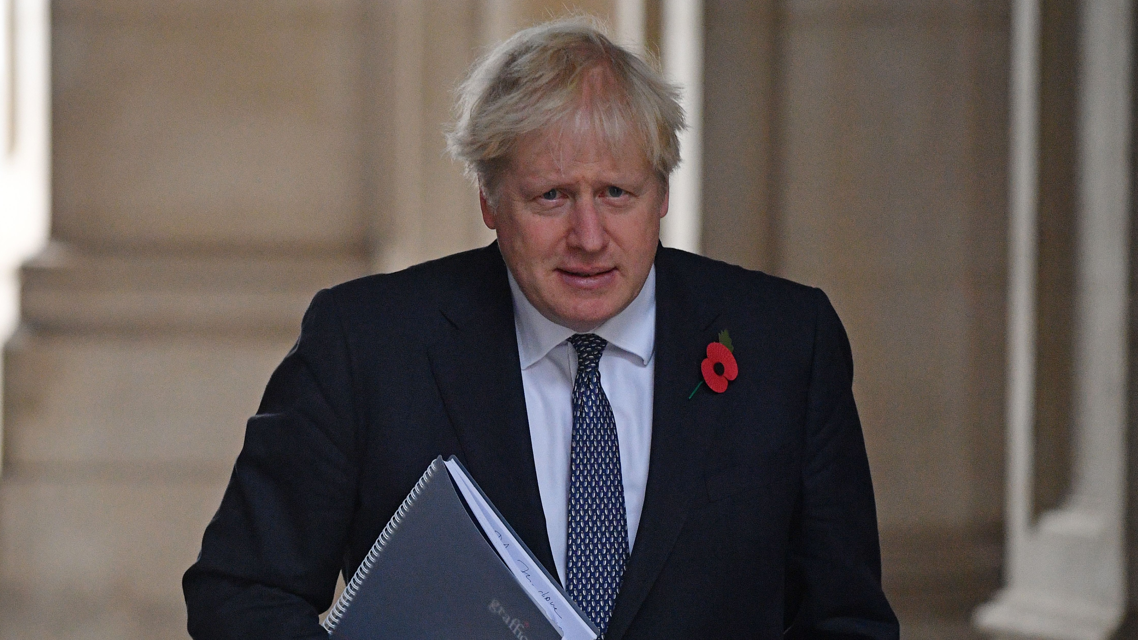 Boris Johnson arrives back at Downing Street in London.