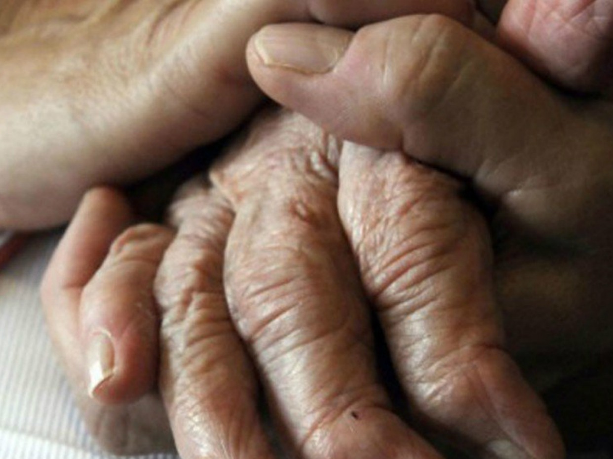 An elderly person’s hand