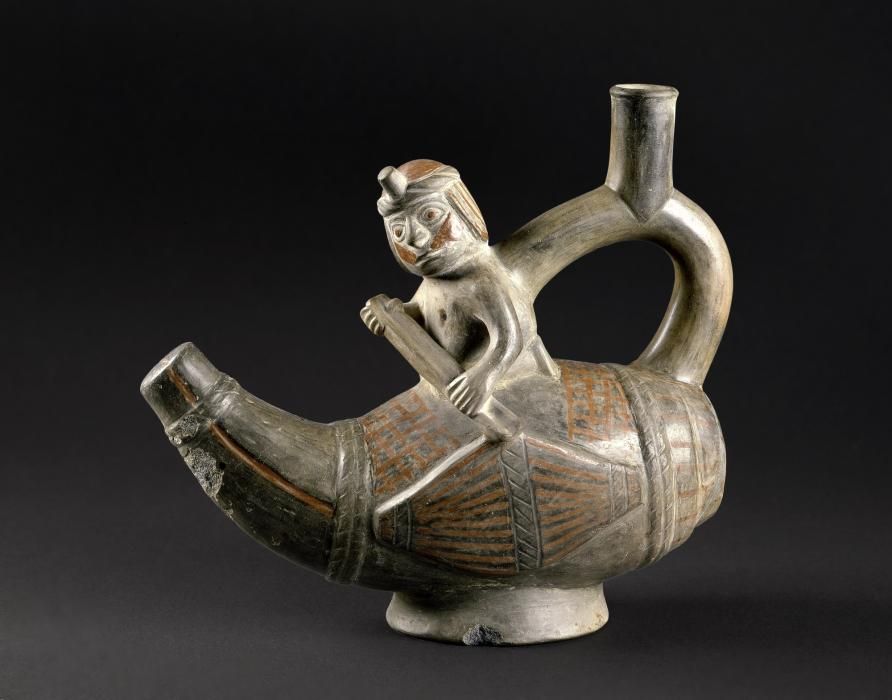 Vessel depicting a human figure in a reed boat