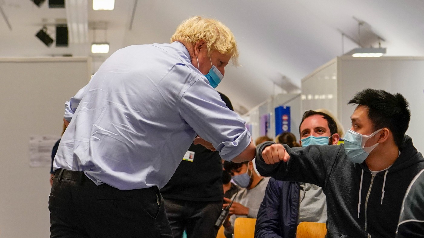 Boris Johnson touching elbows with a member of the public at a hospital 