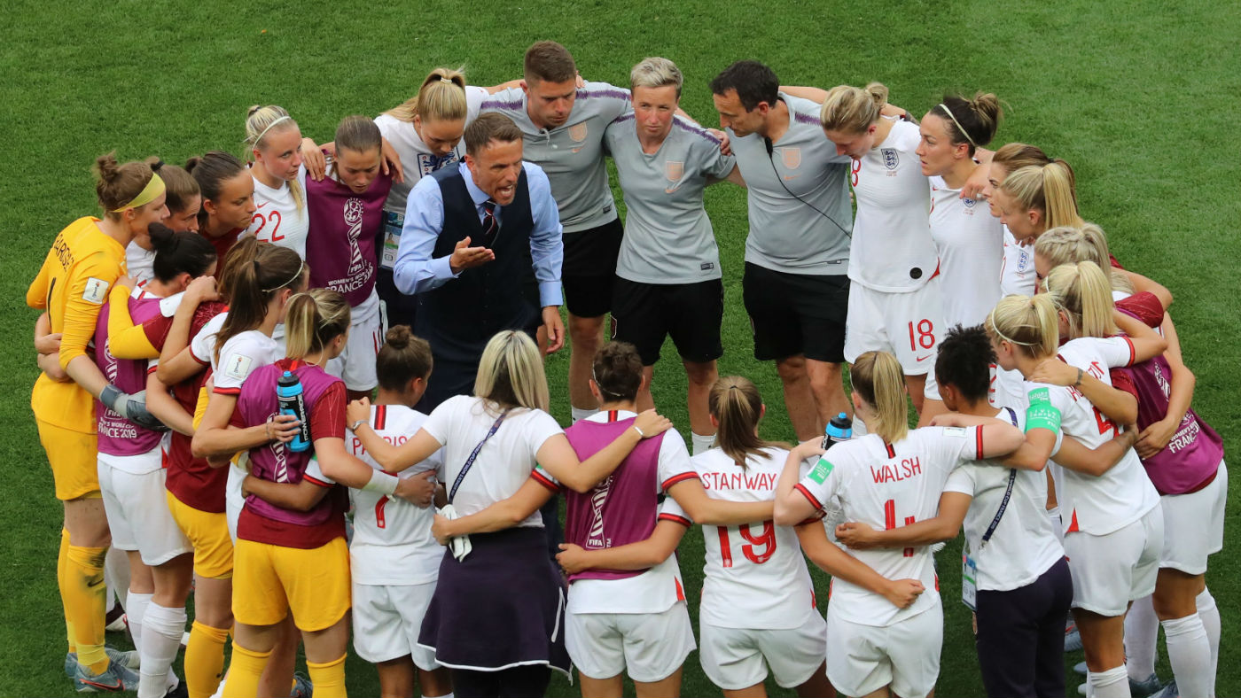 England head coach Phil Neville speaks to his squad after the Fifa Women’s World Cup win against Scotland 