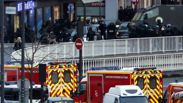 French police storm a kosher grocery in which a gunman had taken hostages