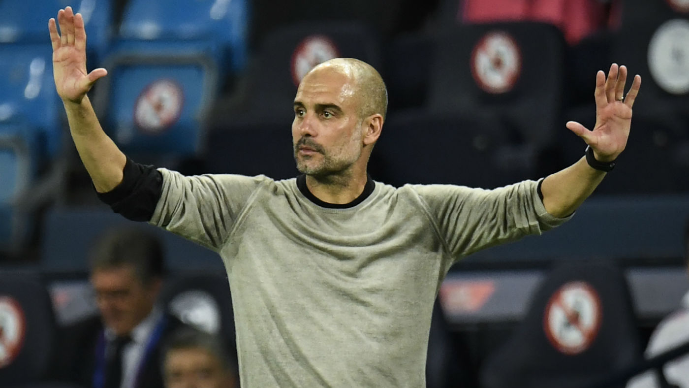 Manchester City manager Pep Guardiola gestures during the 2-1 win against Real Madrid 
